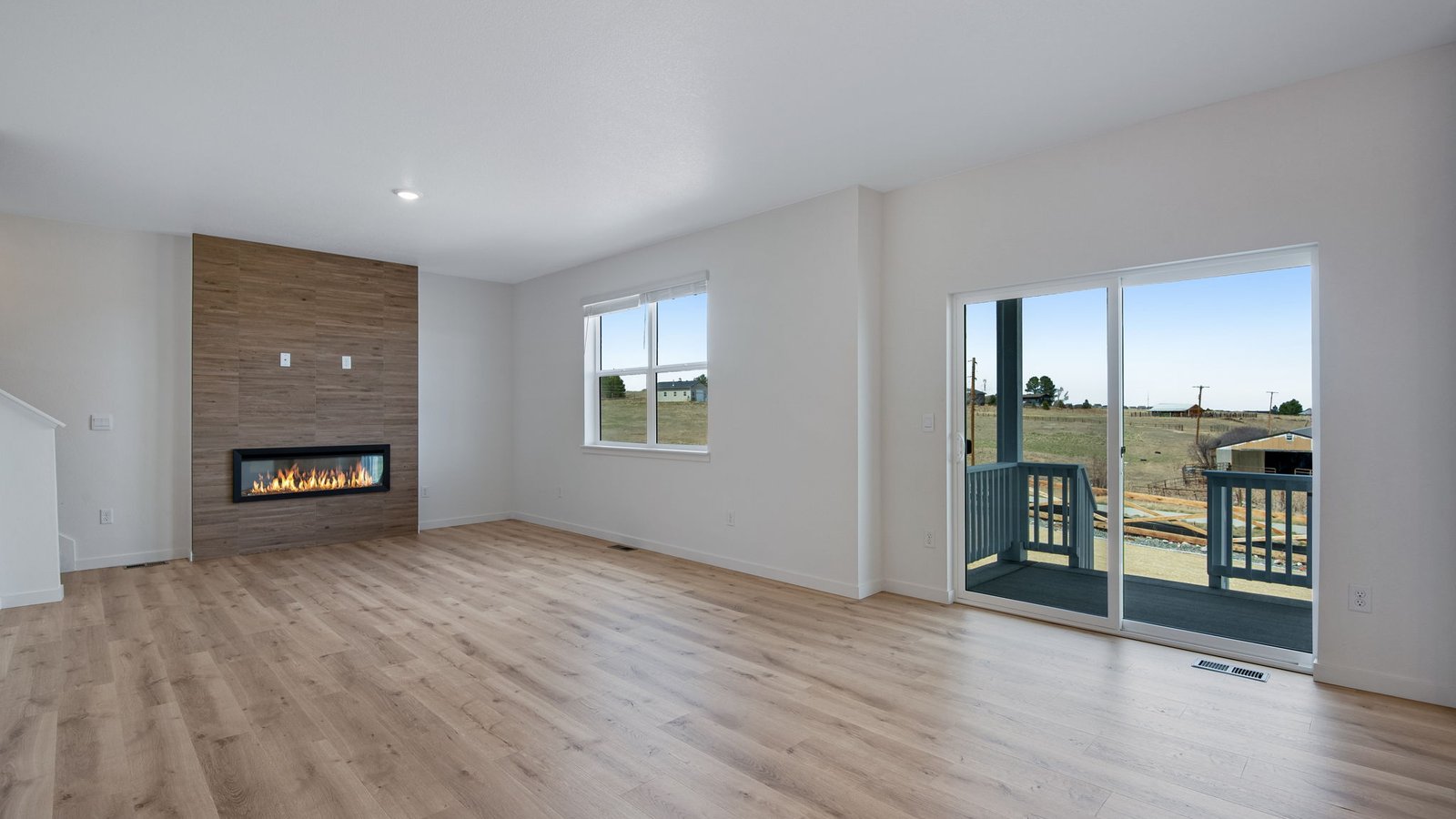 Open concept main level floorplan with fireplace in Parker, Colorado