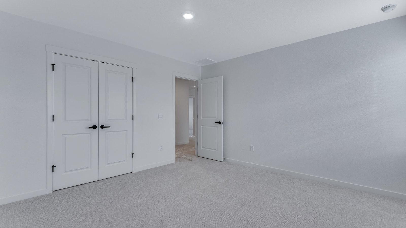 Third bedroom with walk in closet new home