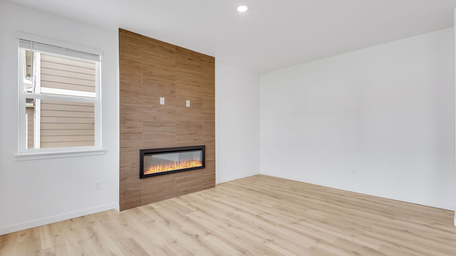 Fireplace with new finishes at Trails at Crowfoot Community