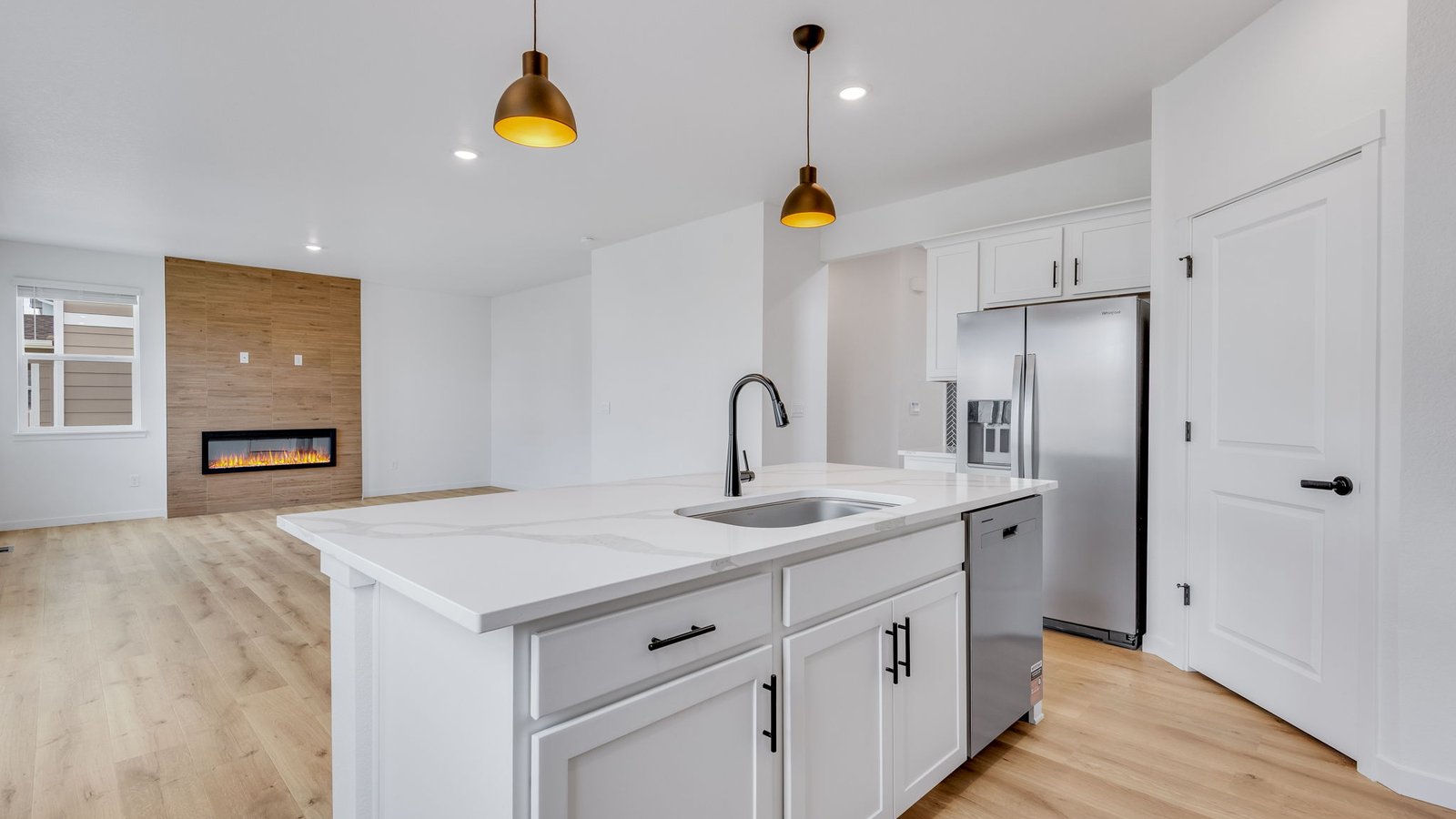 Spacious kitchen island perfect for entraining in new home at Trails at Crowfoot