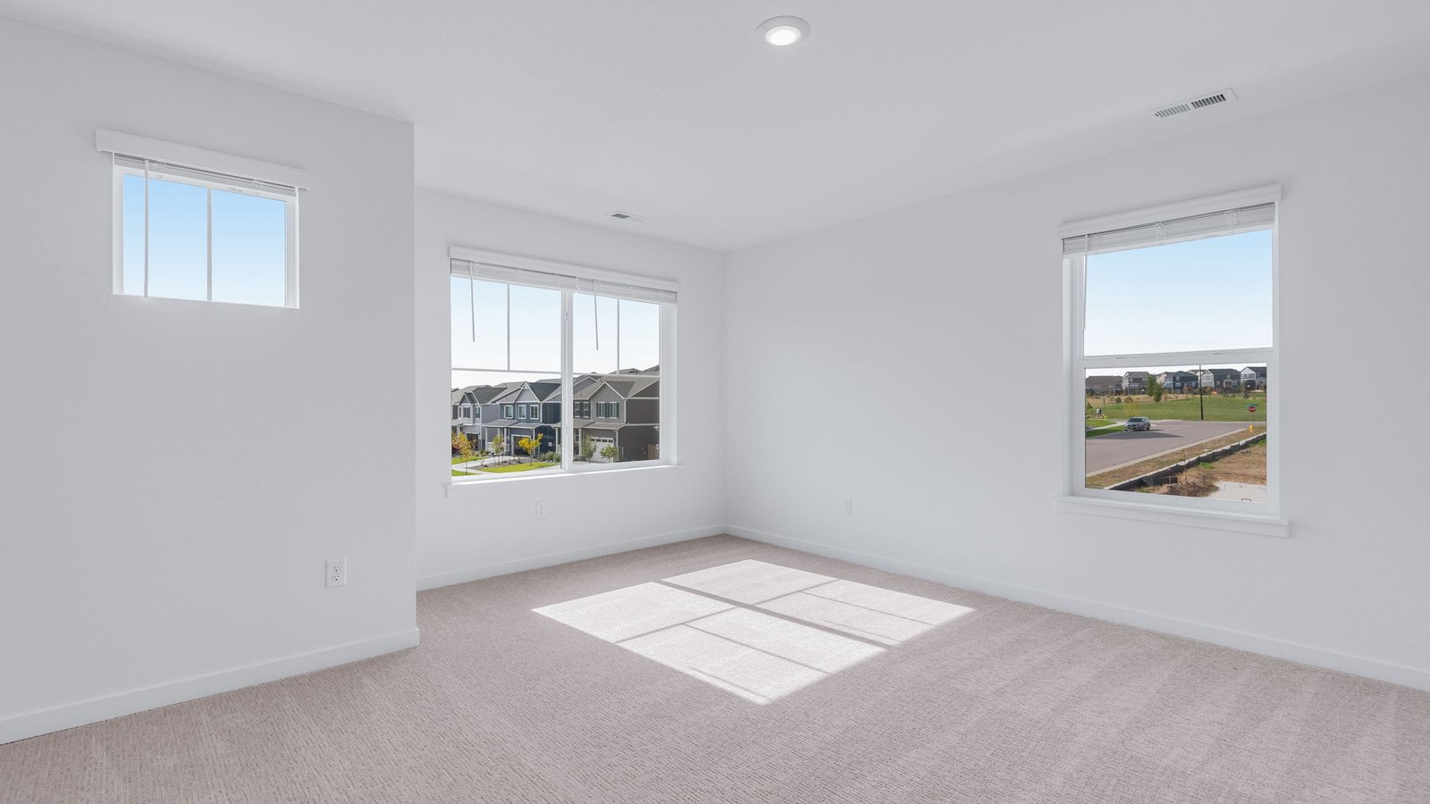 Secondary bedroom in new home at Trails at Crowfoot Community