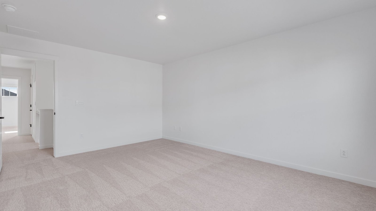 Spacious Primary bedroom in Holcombe floor plan new home
