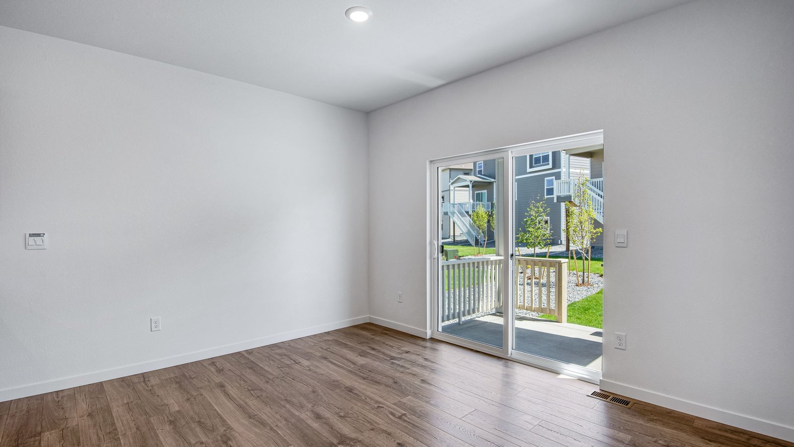 Dining room area in new home with access to the backyard