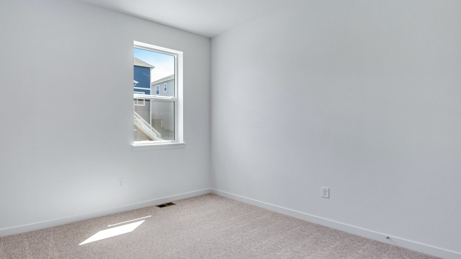 Secondary bedroom in new home at Trails at Crowfoot Community