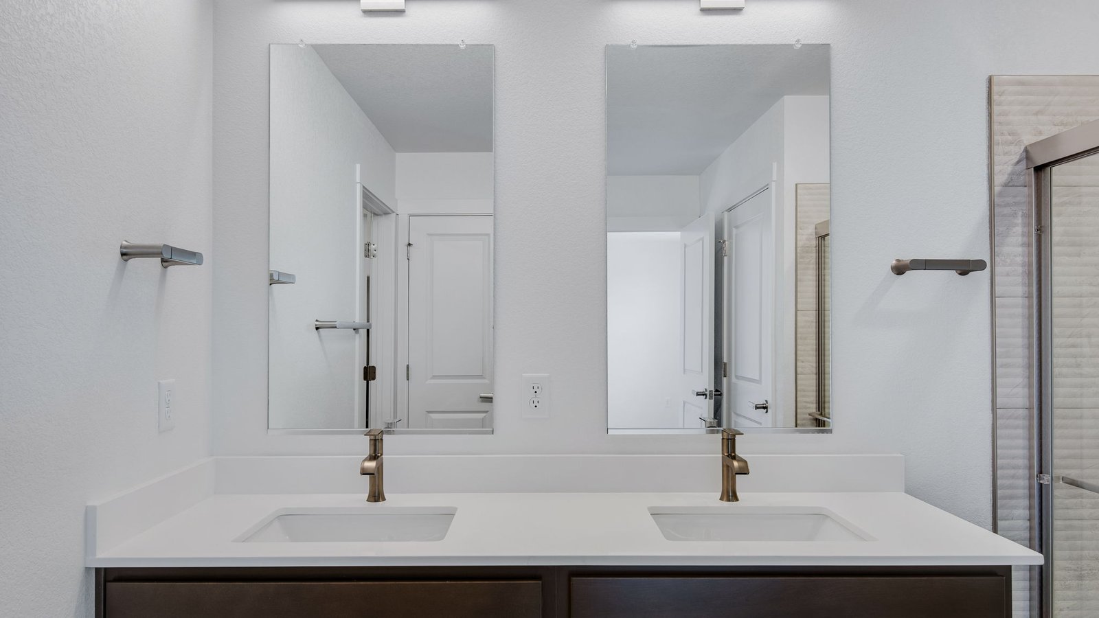 Attached private primary bathroom in new home conveniently located at Trails at Crowfoot Community