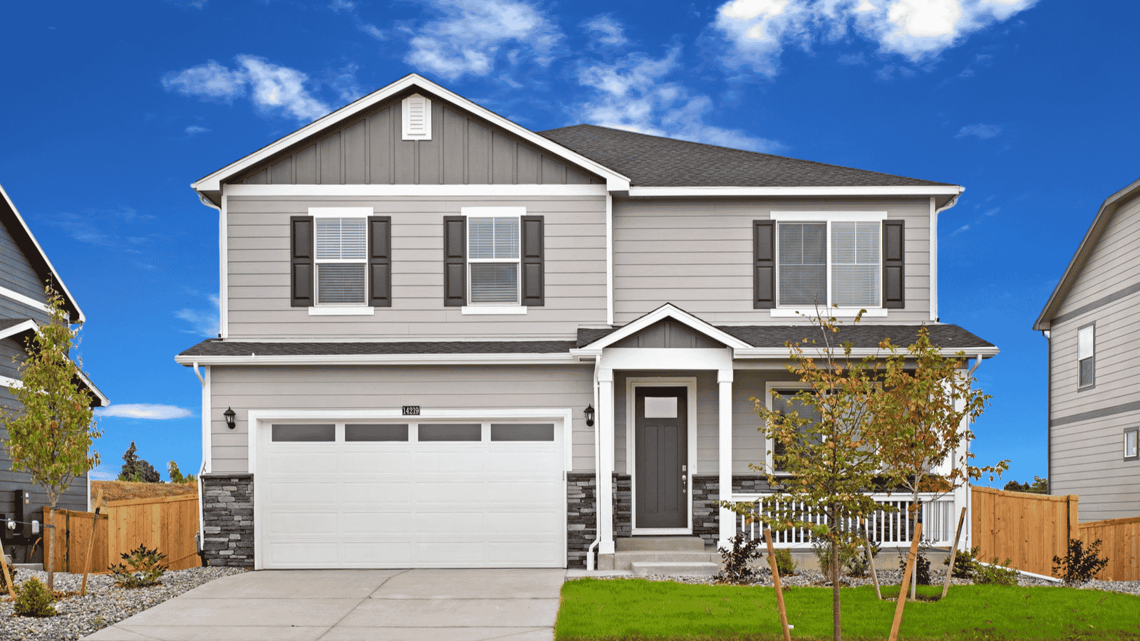 Exterior of two story home Henley floor plan in new D.R. Horton home in Parker Colorado