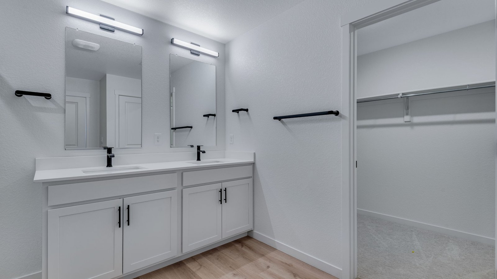 Dual vanity primary bathroom in Henley floor plan