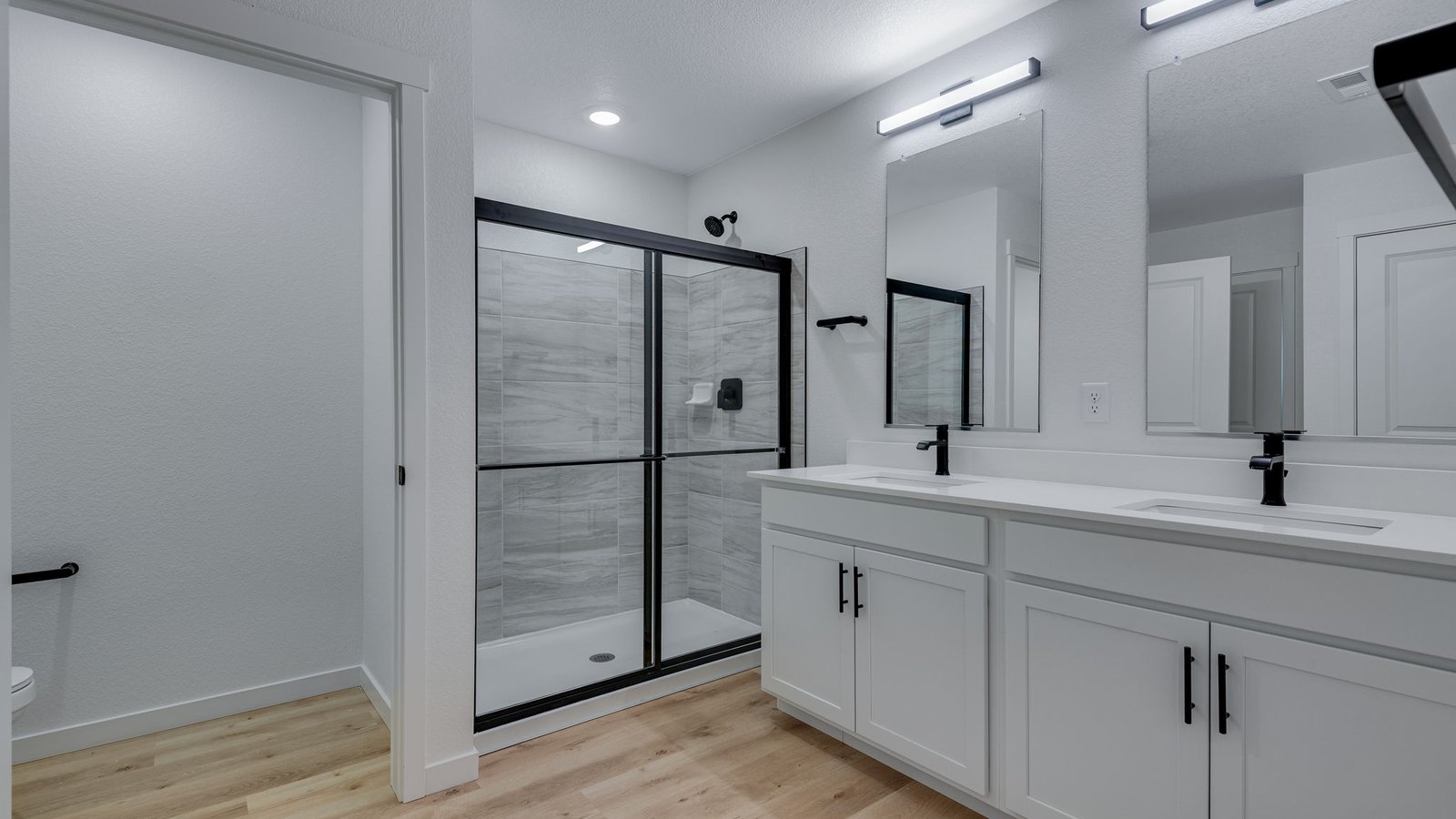 Private generously sized primary bathroom