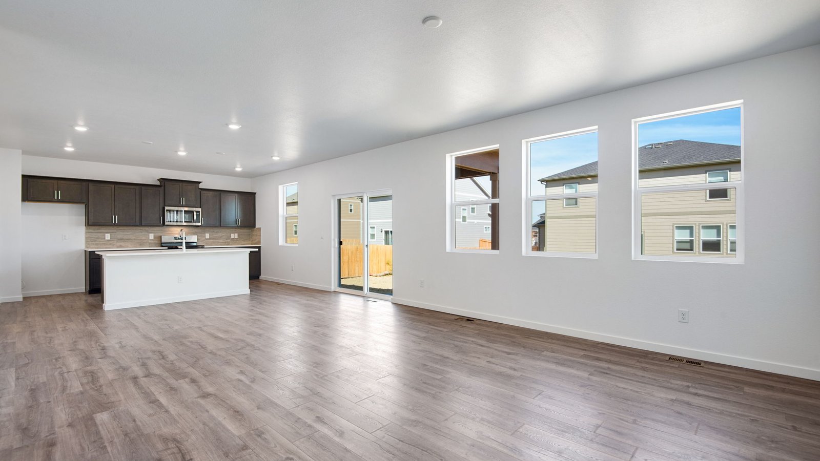 Open concept layout with large windows in new home community in Parker Colorado