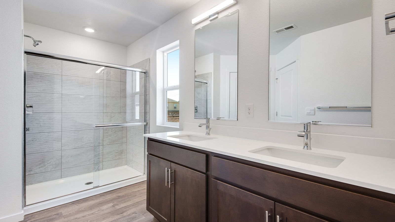 Spacious private primary bathroom in new home community in Parker Colorado