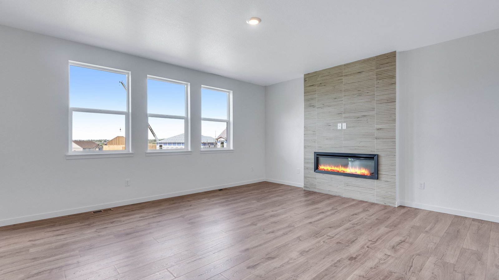 Open concept layout with large windows in beautiful new Parker Colorado home