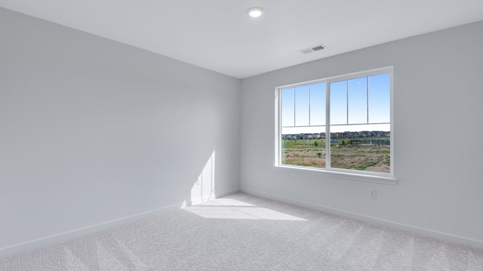 Secondary bedroom in new D.R. Horton home at Trails at Crowfoot community