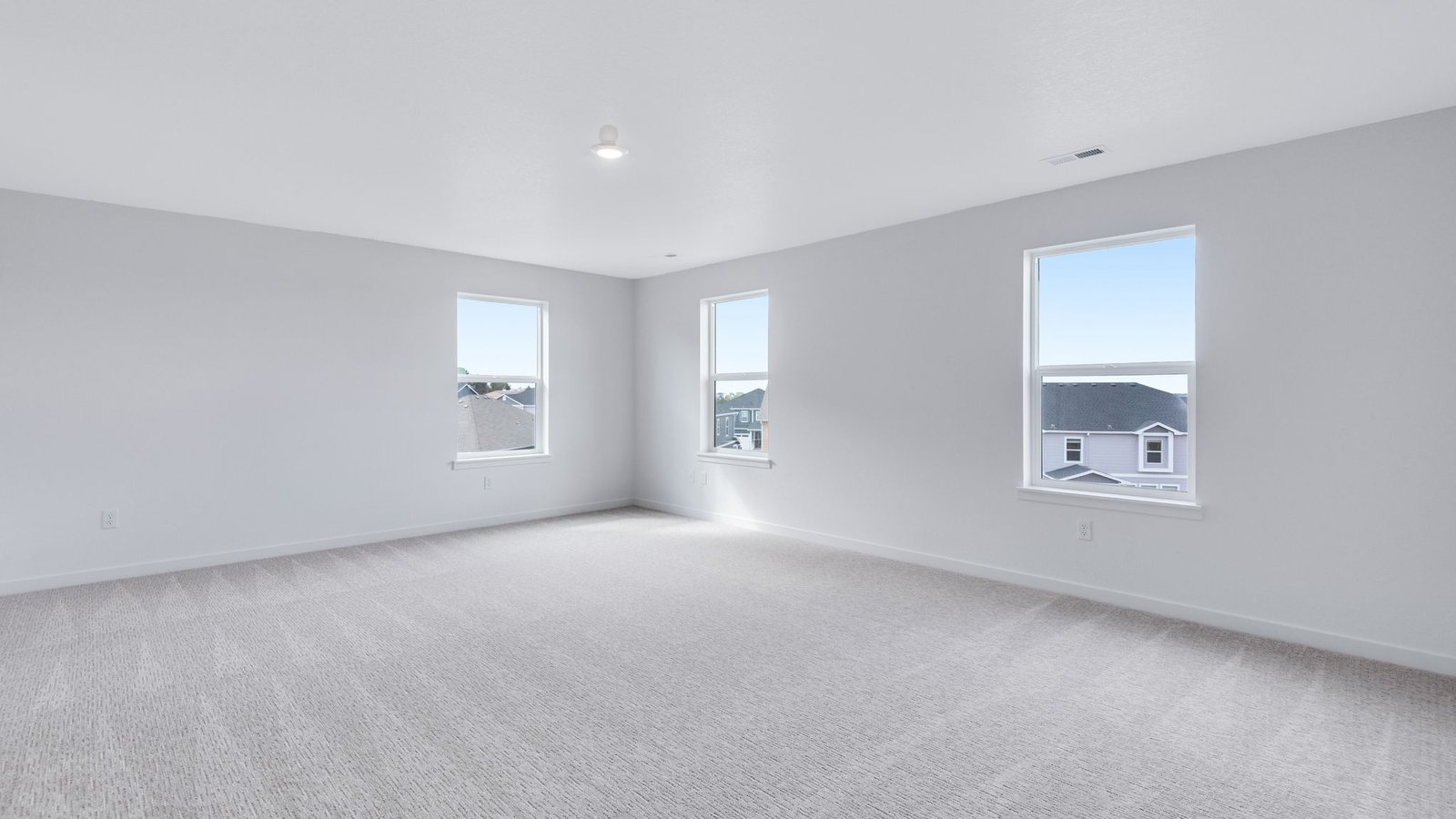 Primary bedroom space in new home at Trails at Crowfoot