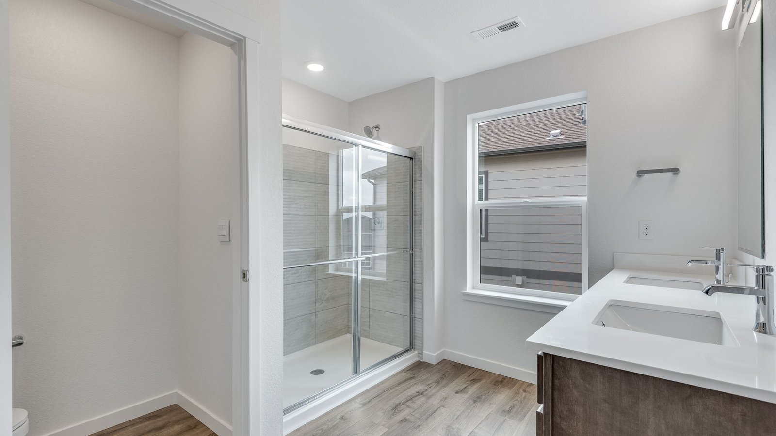 Spacious private attached primary bathroom in new D.R. Horton home at Trails at Crowfoot community in Parker Colorado