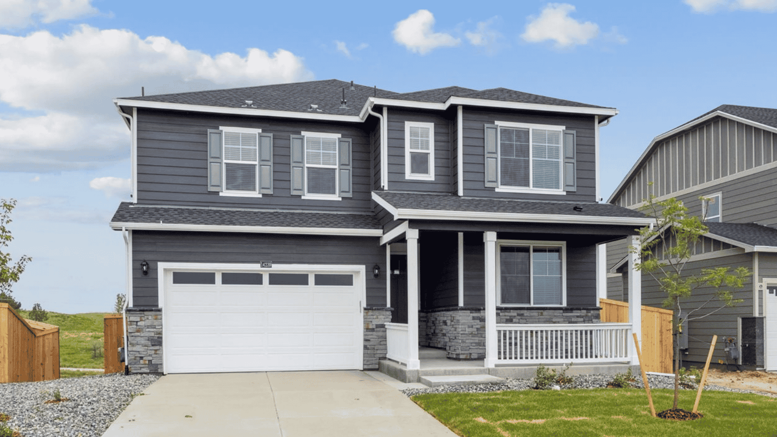 Exterior of two story new home at Trails at Crowfoot community in Parker, Colorado