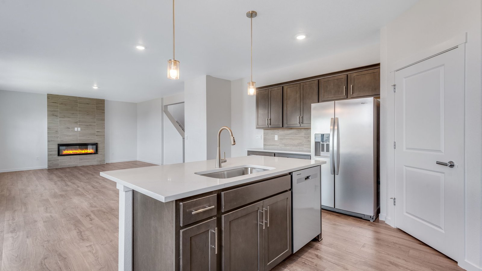 Kitchen island perfect for entertaining in new home at Trails at Crowfoot community