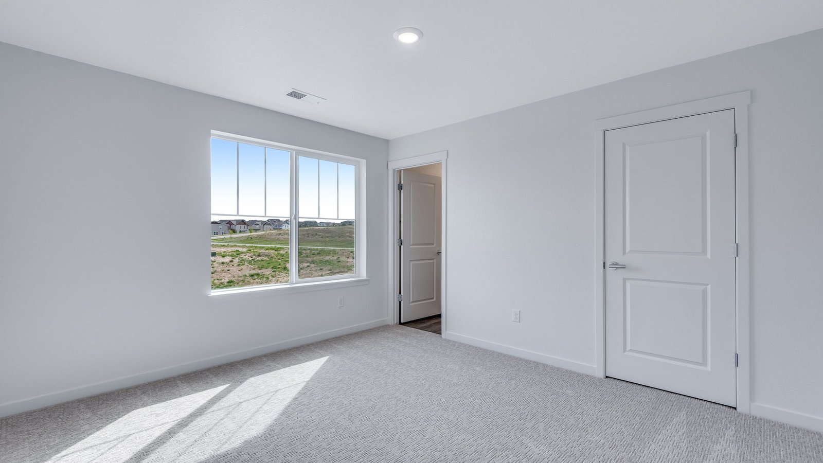 Versatile secondary bedroom in Trails at Crowfoot home