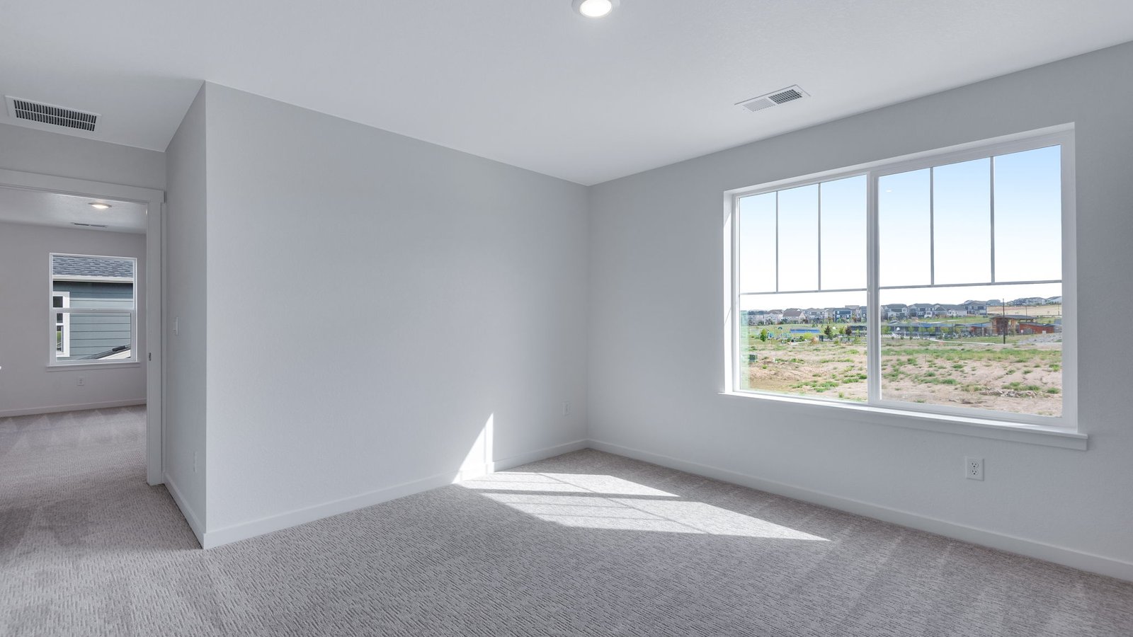 Versatile loft space great for work or play in new home at Trails at Crowfoot community