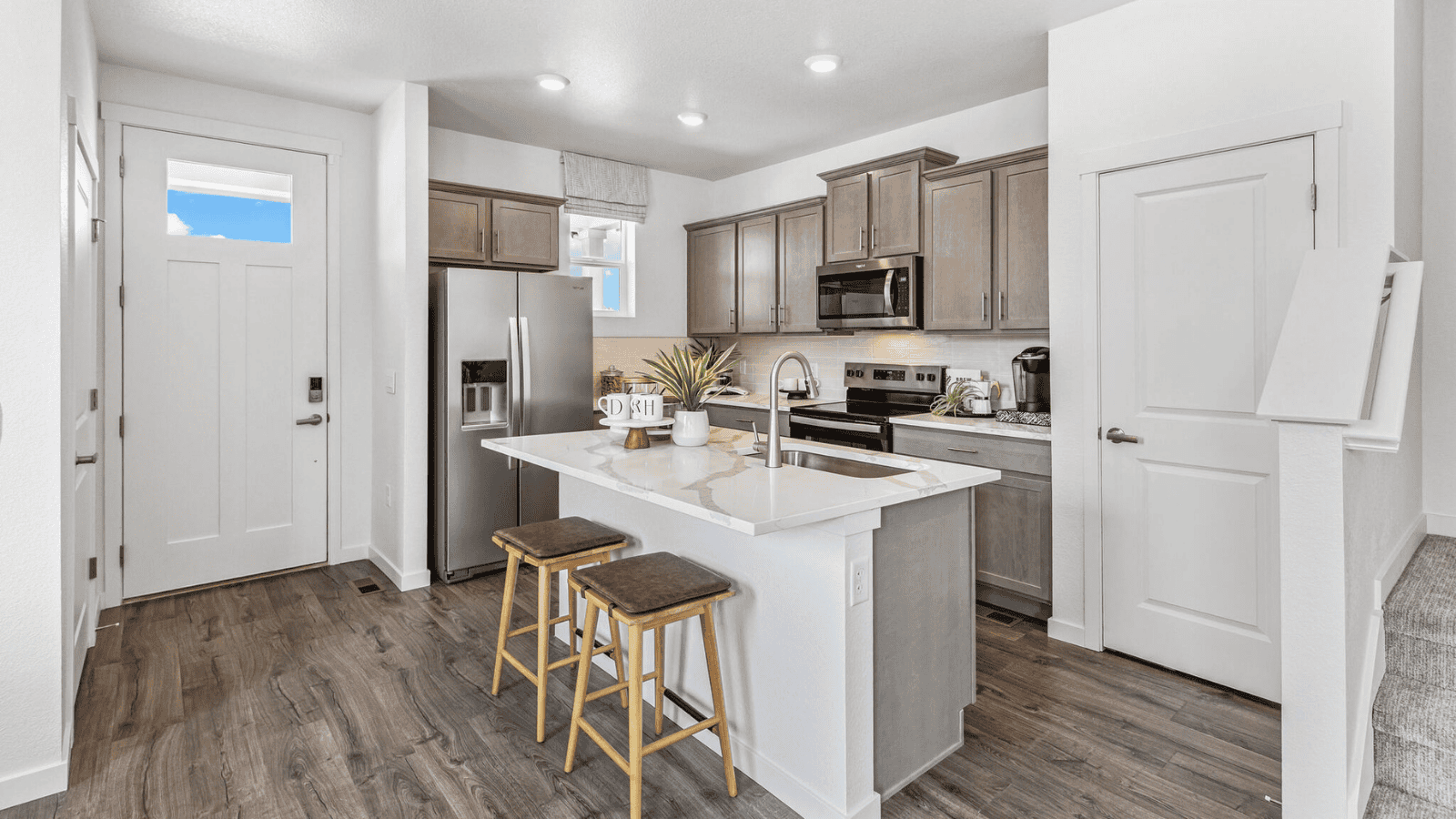 Spacious kitchen island perfect for entertaining in new D.R. Horton home in Colorado
