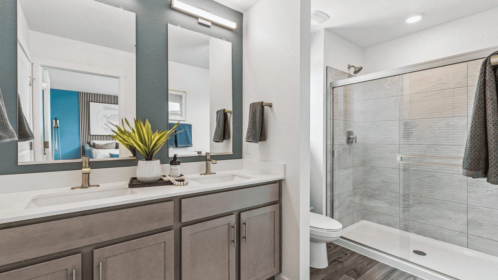 Private attached bathroom with dual vanity sinks in new home build in Arcadia Community