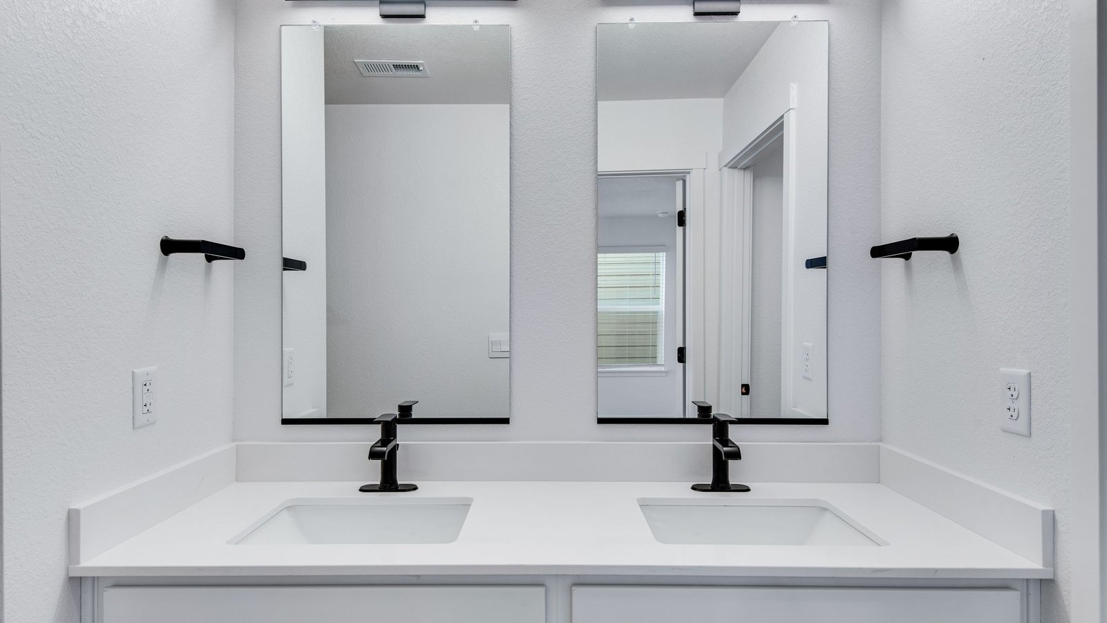 Full bath with black finishes in new D.R. Horton townhome