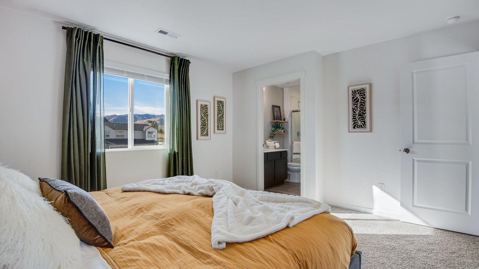Spacious Primary bedroom in new Colorado Springs home at The Ridge at Lorson Ranch community