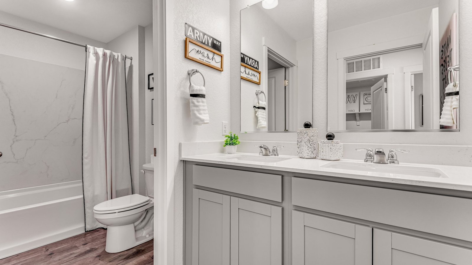 Secondary bathroom with updated fixtures and bright, clean design
