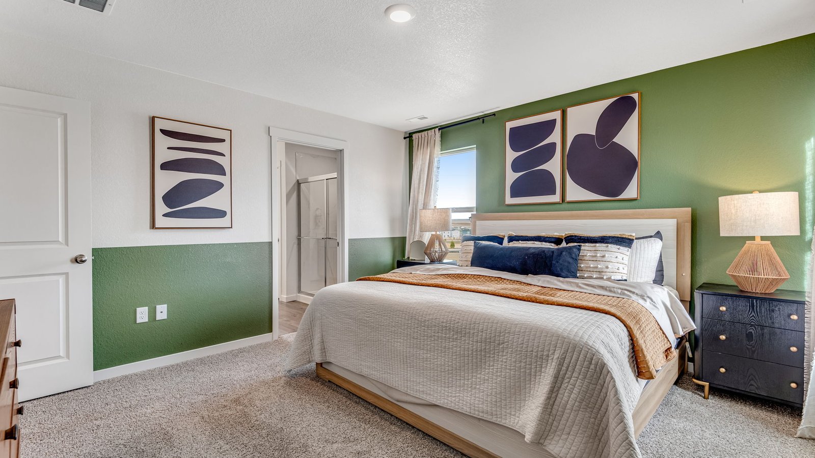 Private owner’s suite with ample space for a king bed and relaxing retreat feel.