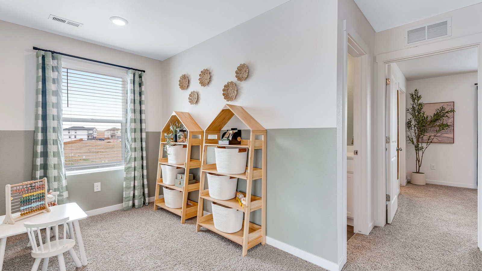 playroom with stripes in new construction home by D.R. Horton Colorado Springs, CO