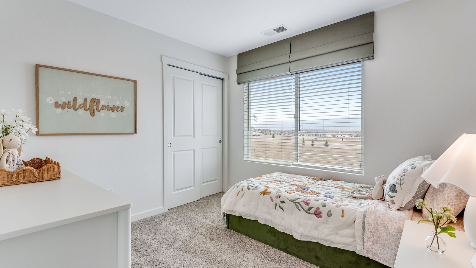 girl's bedroom of model at Lorson Ranch in Colorado Springs