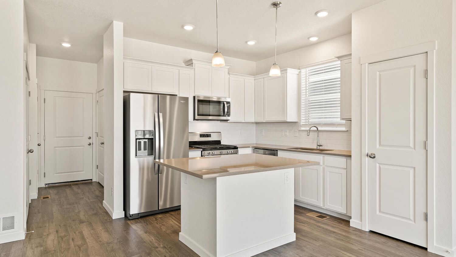 white kitchen in new home
