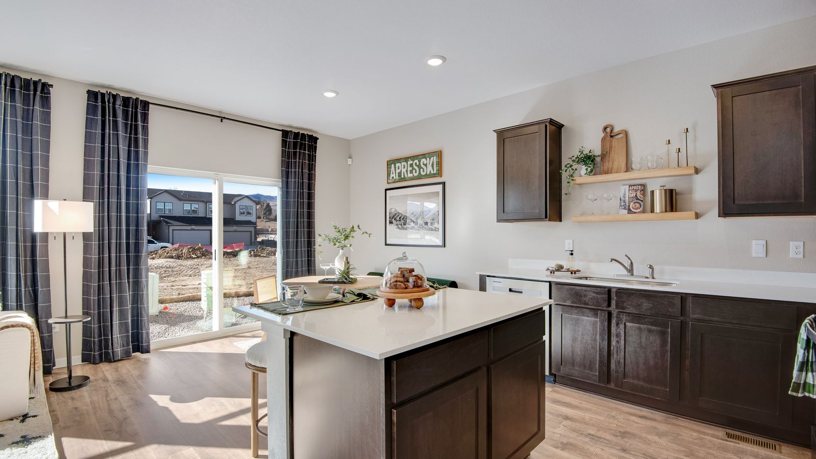 kitchen with dark cabinets in new model home colorado springs, co