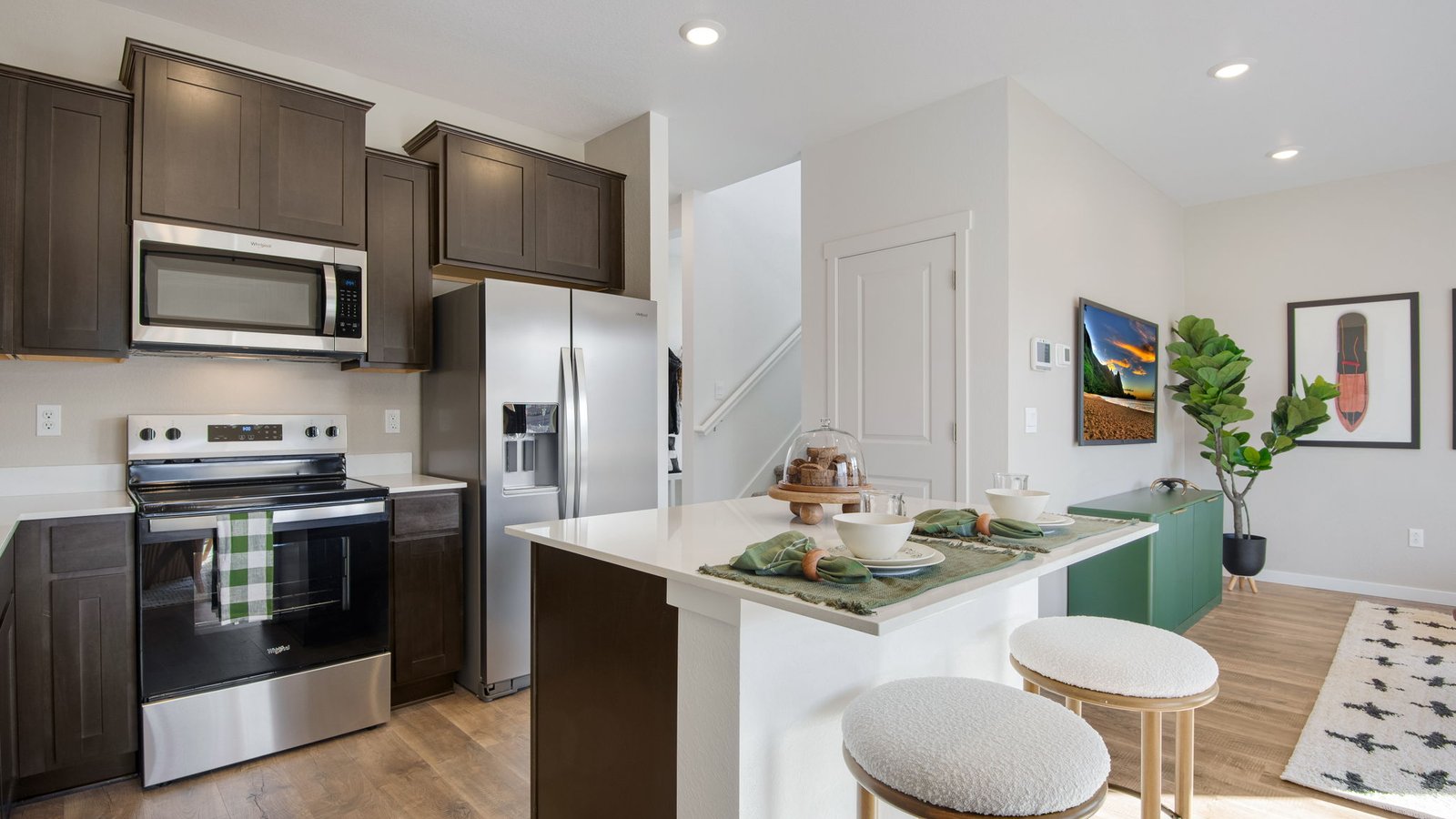 kitchen and island in new model home by d.r. horton colorado springs