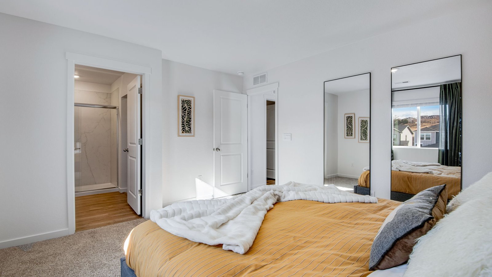 primary bedroom decorated as ski lodge