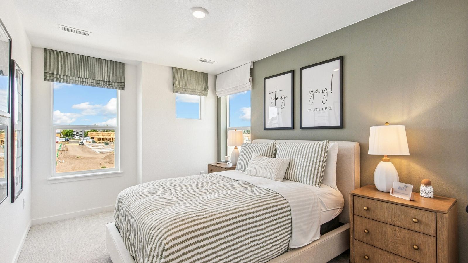 Secondary bedroom with large windows in Denver new home community Arcadia