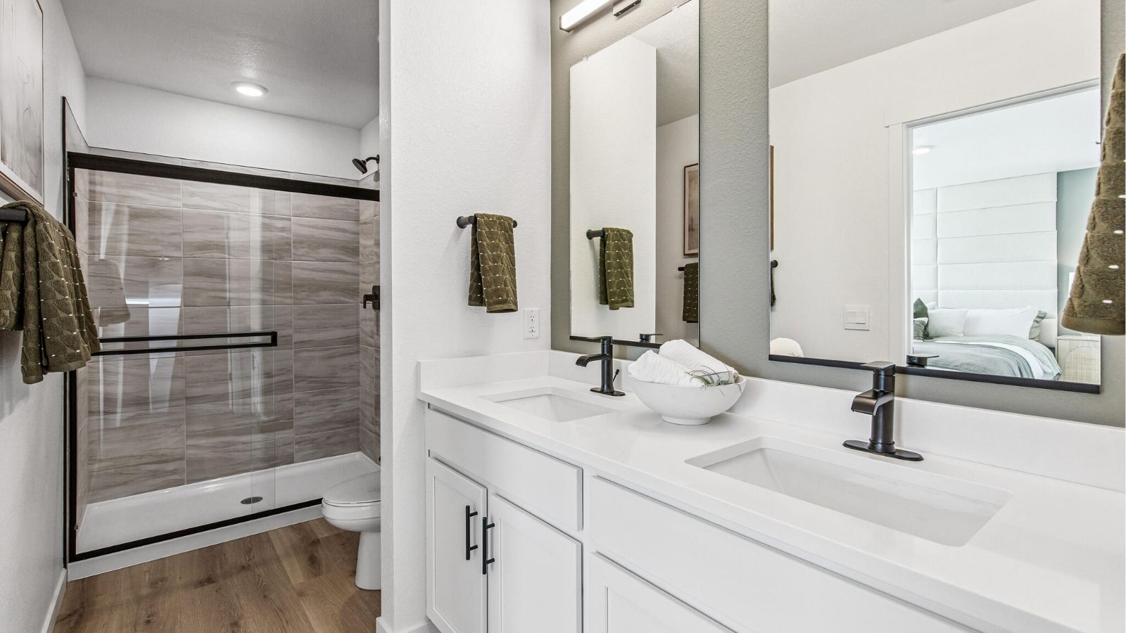 Private attached bathroom with dual sinks in new D.R. Horton home in Arcadia Community