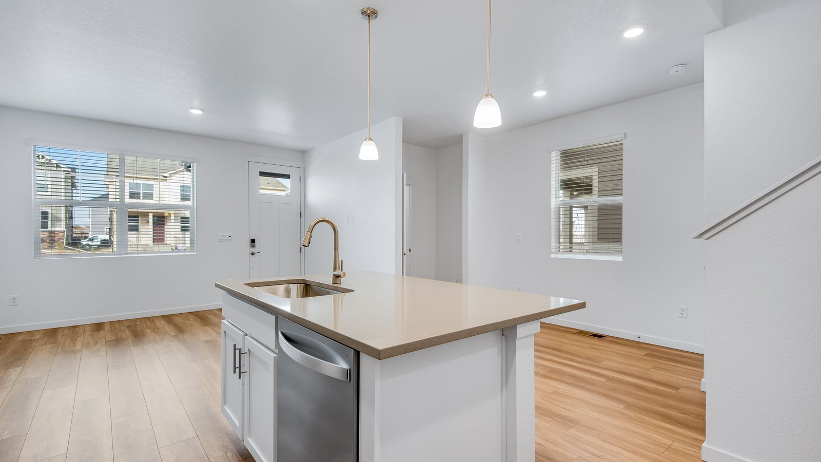 Spacious kitchen island in new home in Commerce city colorado