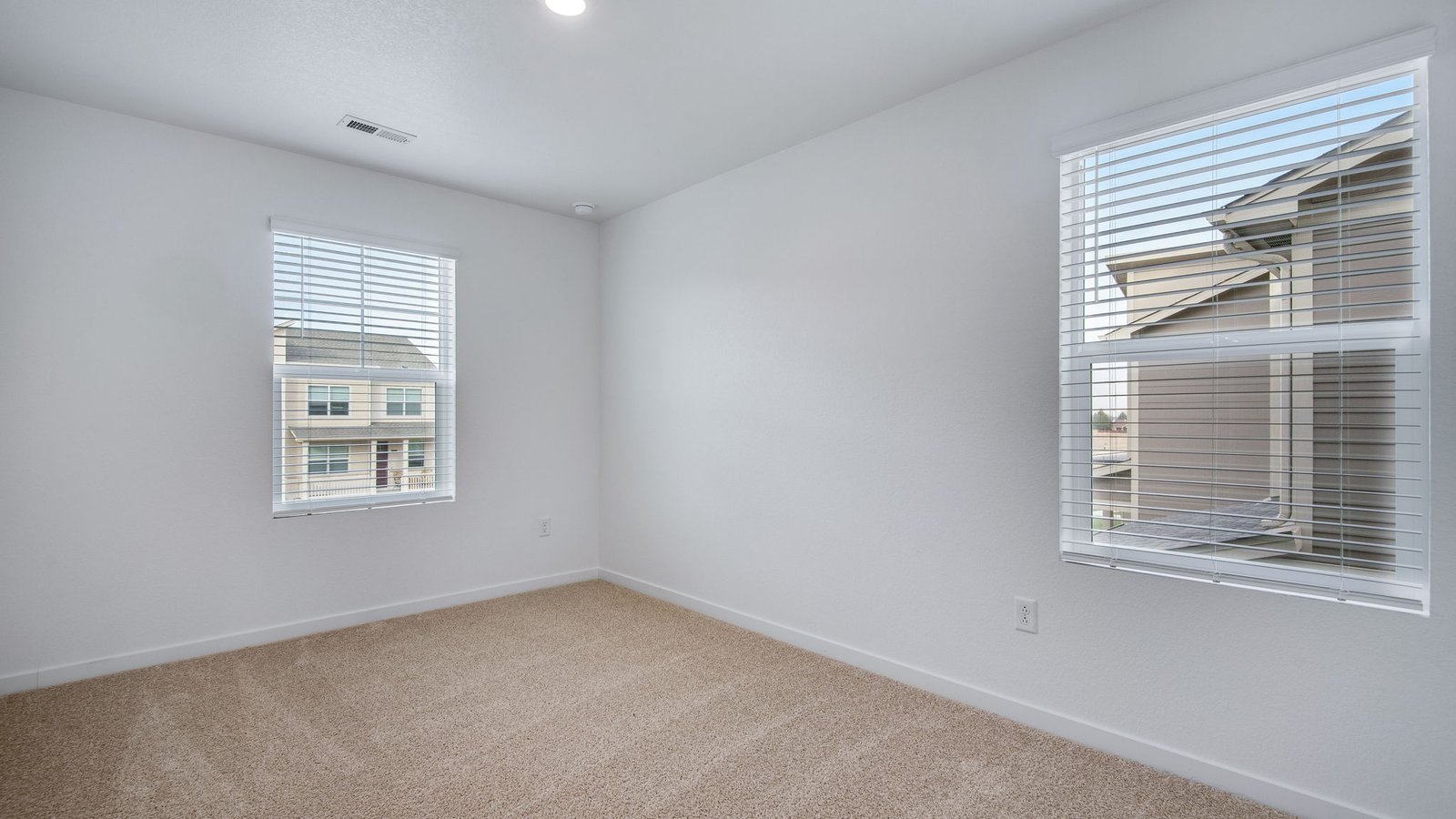 Secondary bedroom of new home in Commerce City Colorado