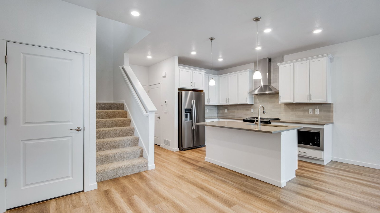Open floor concept of new home at Settler's Crossing community in Commerce City Colorado
