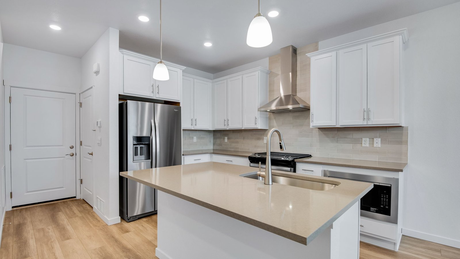 Spacious kitchen with new finishes in home at Settler's Crossing