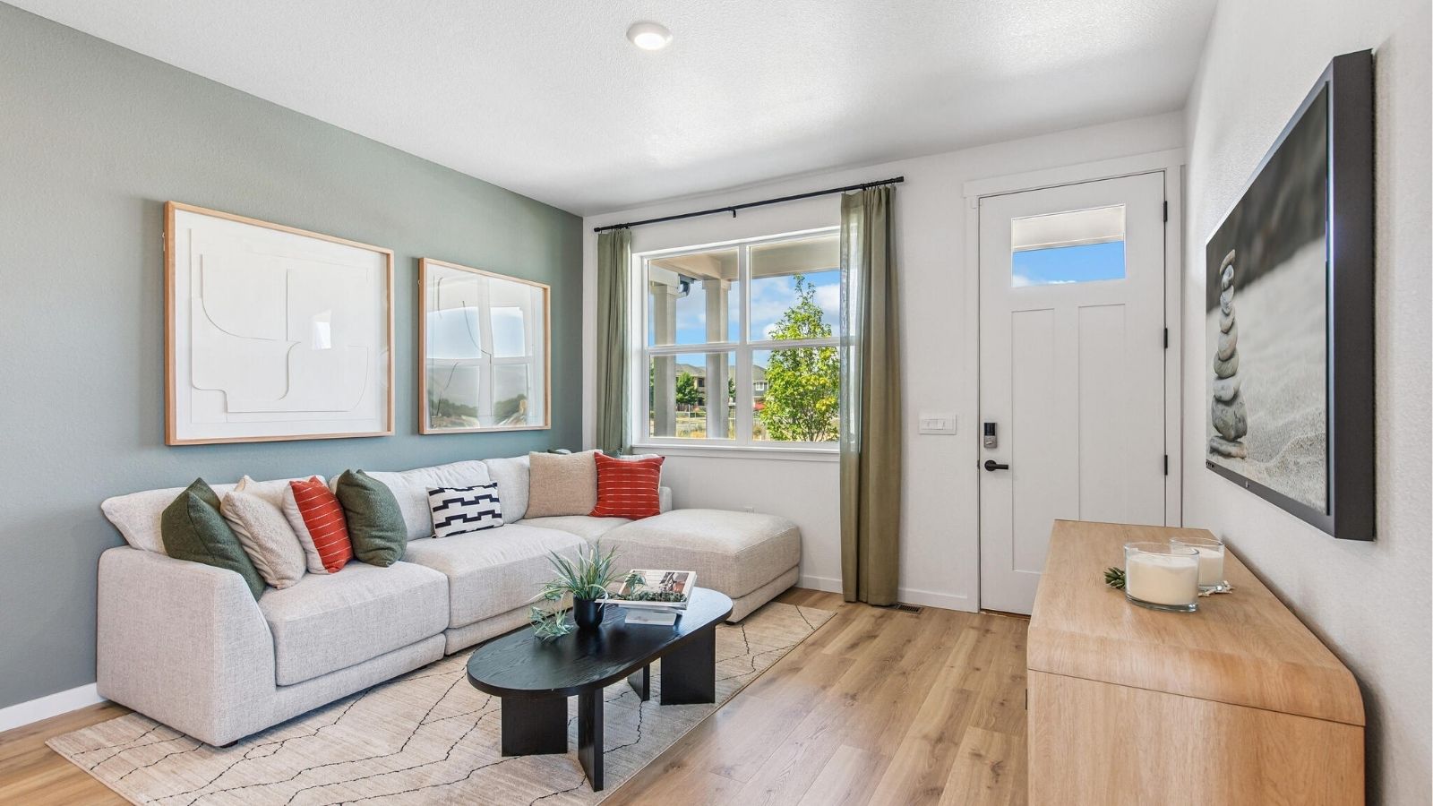 Living room with bright lighting in new home for sale