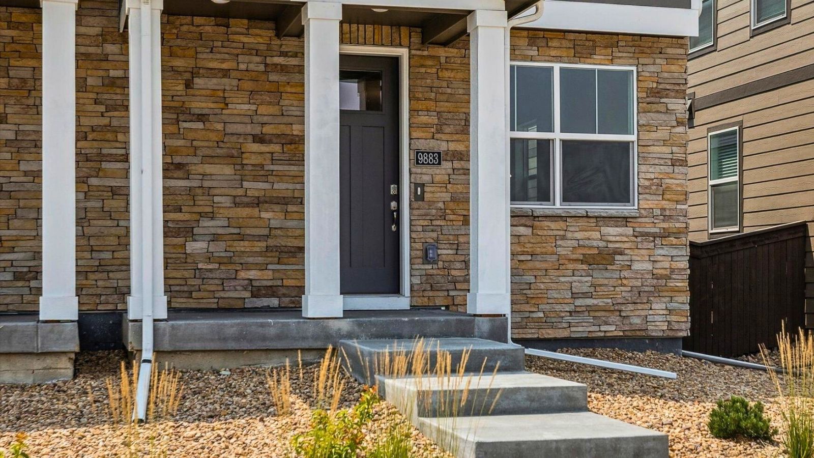 Front exterior of new paired home for sale in Commerce City