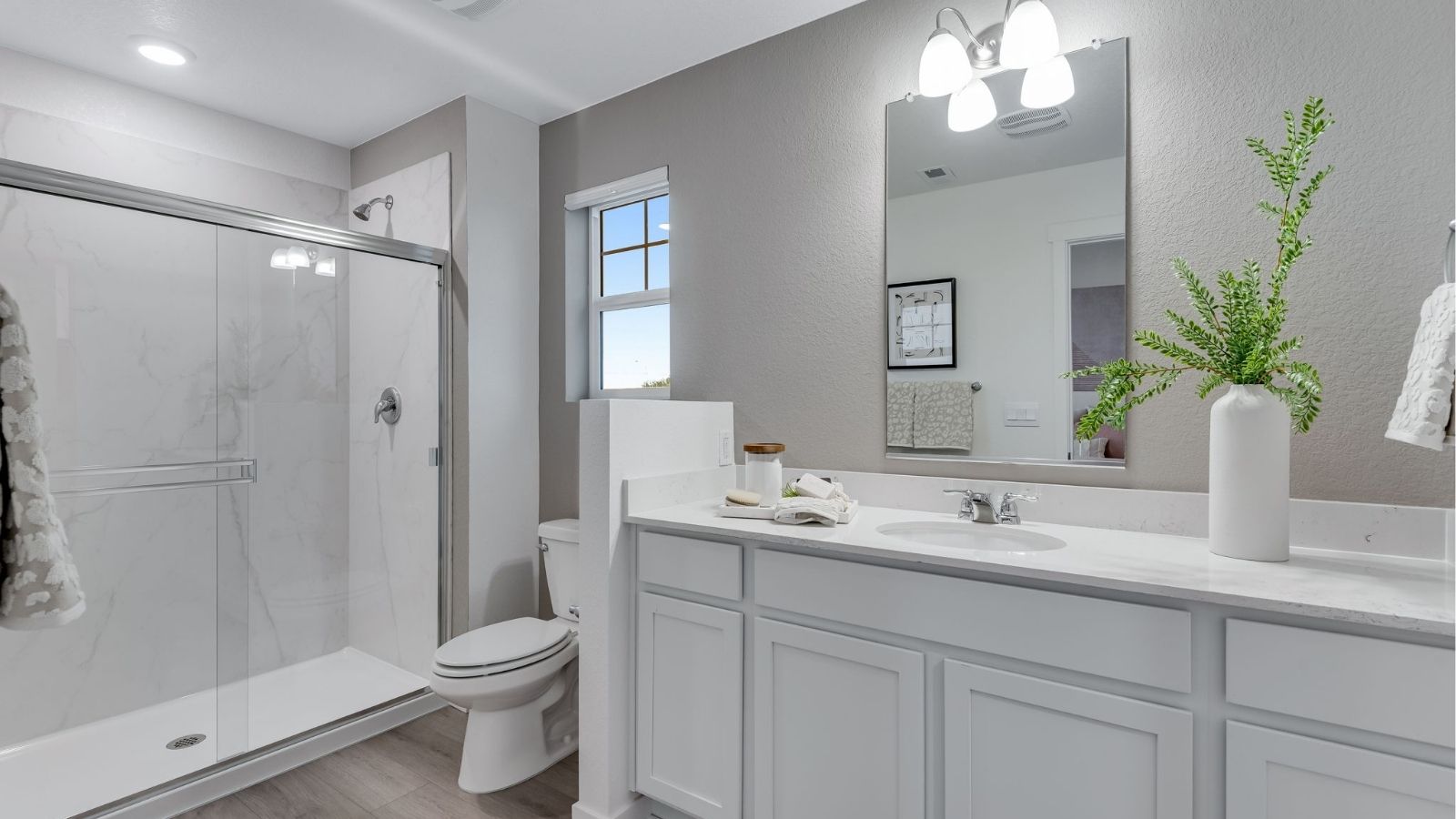 Primary bathroom with dual vanity in Augusta paired home