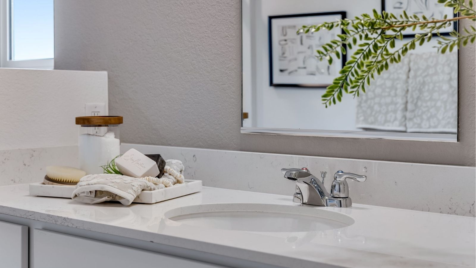 Clean, contemporary bathroom in Commerce City new home
