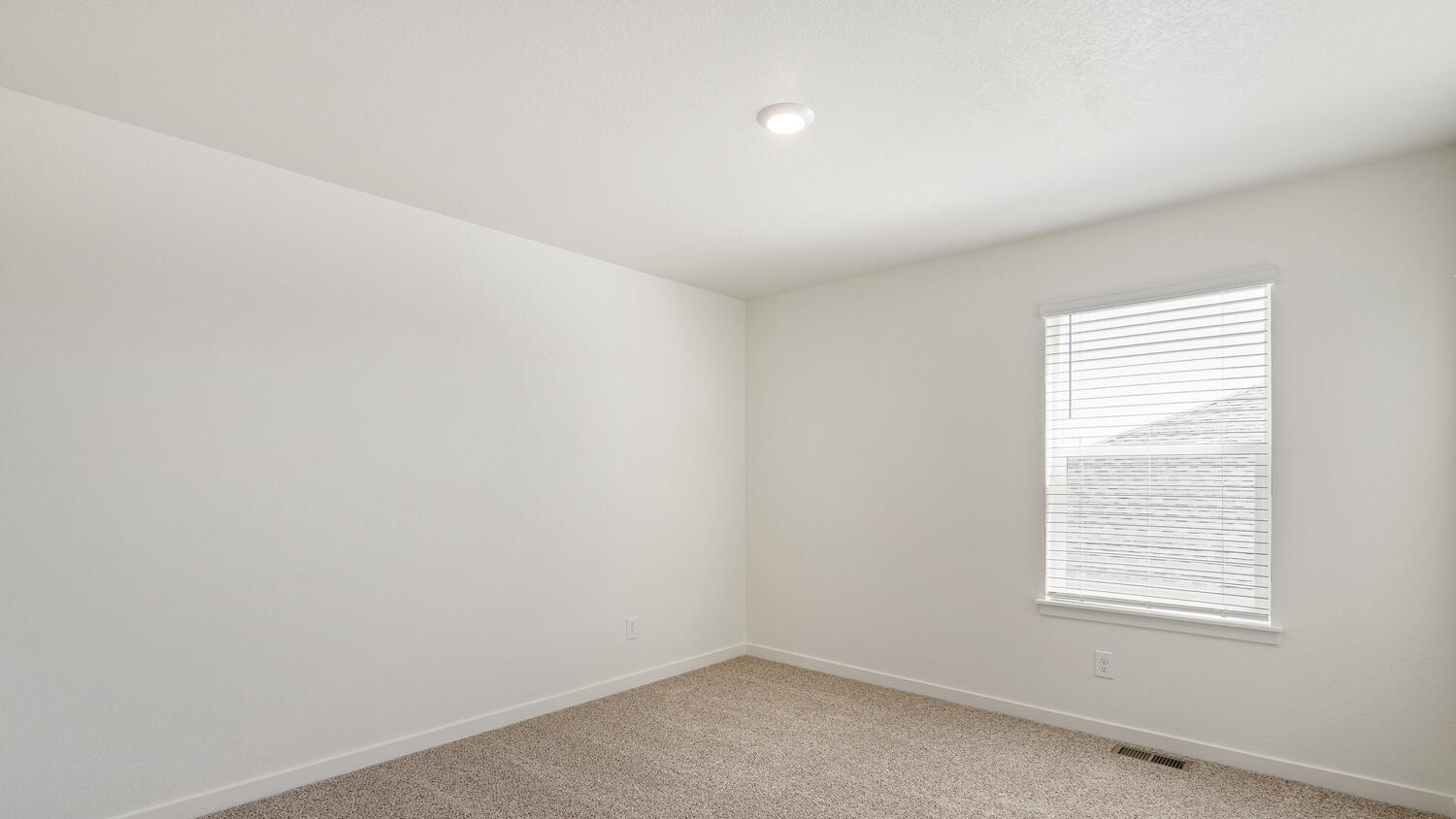 Another secondary bedroom near second bathroom with LED lighting and plush carpeting
