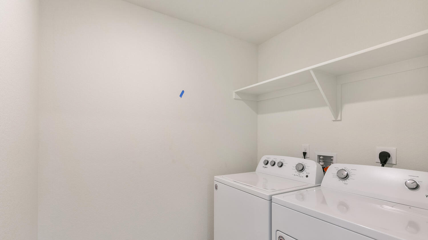 Upper floor laundry room in central location with full size washer/dryer hookups