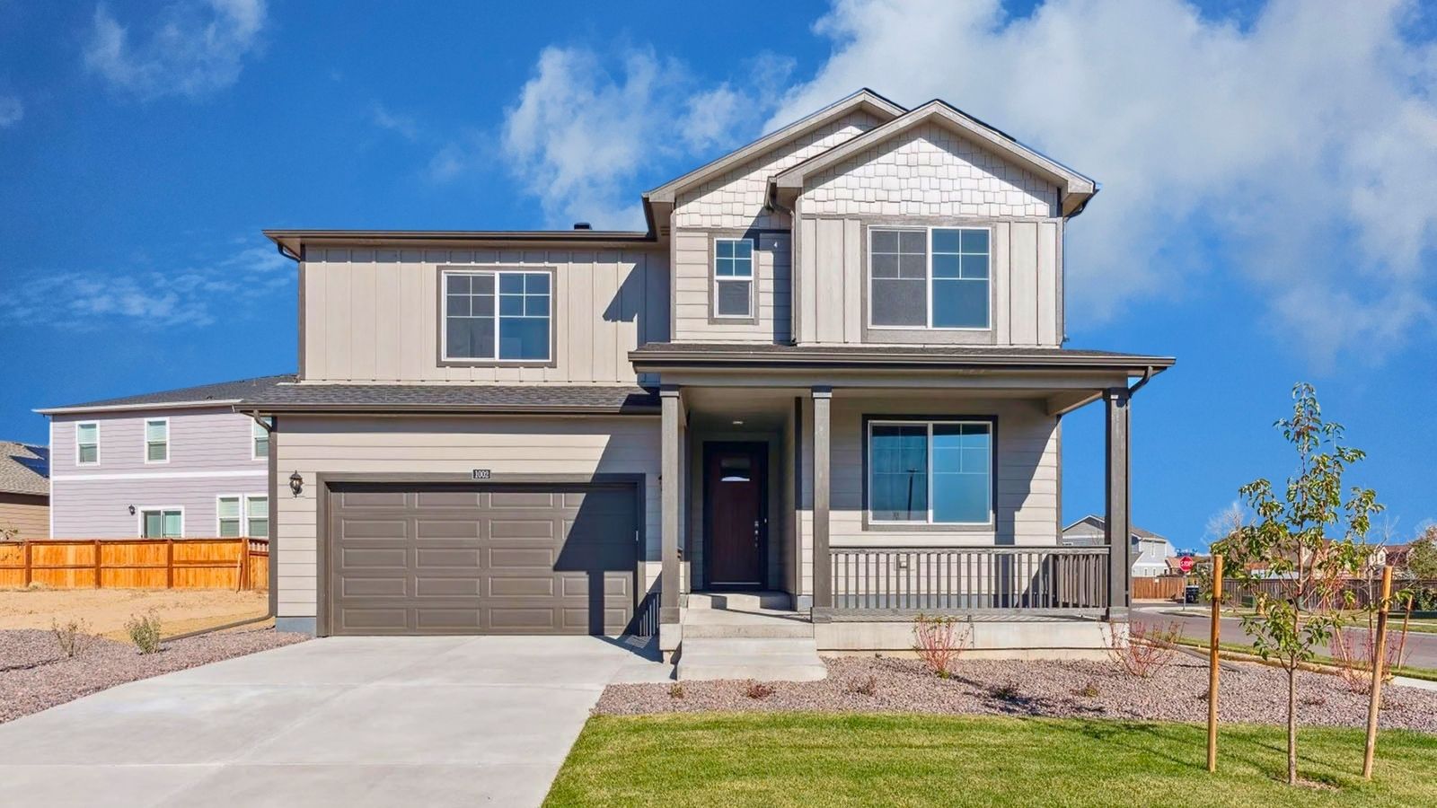 Exterior of two story bedroom in Hennessy floor plan of new Colorado home