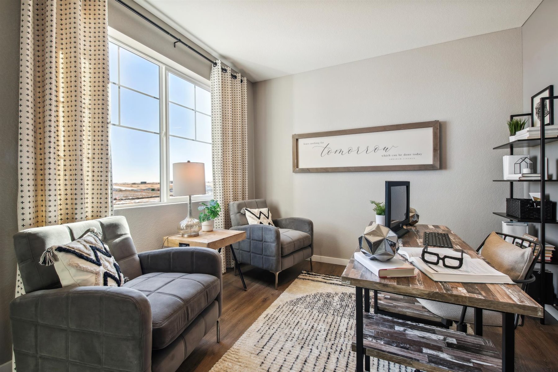 Closer view of study featuring large window for ample natural light