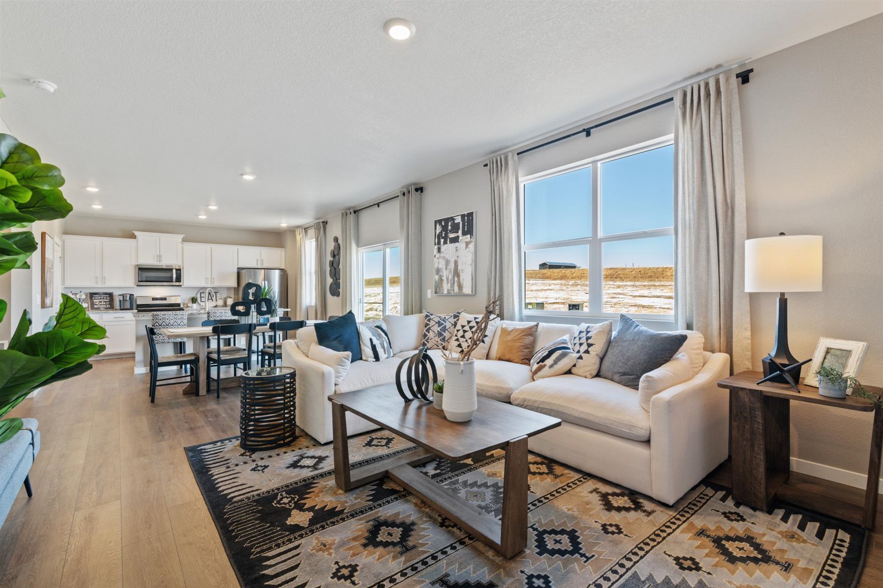 Alternate view of great room with dining and kitchen behind