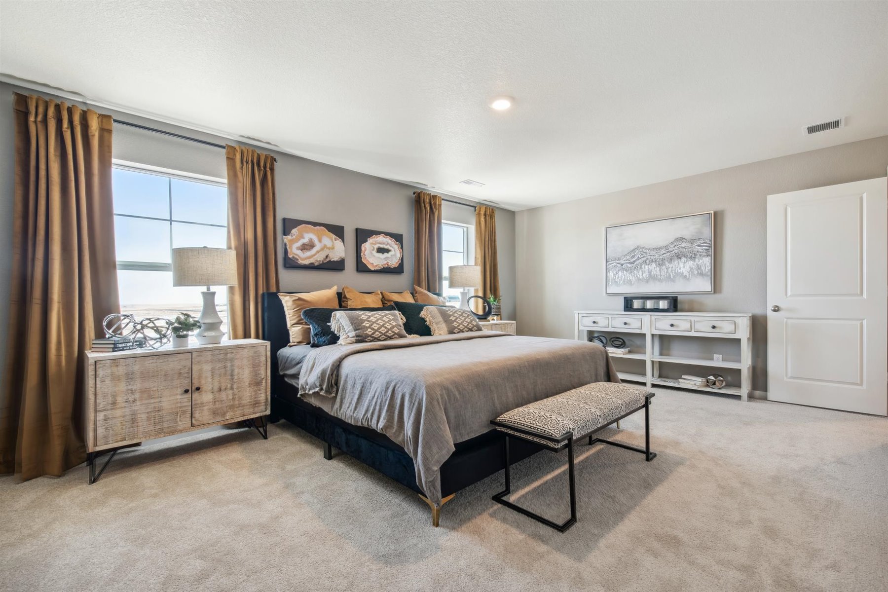 Alternate view of primary bedroom featuring plenty of space